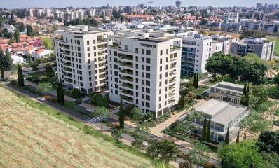 הדמיית רחפן של בניינים חדשים של חברת פרשקובסקי בגן רש"ל הרצליה. ליד שדות ומבט על השכונה