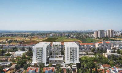 מעונות הסטודנטים המתוכננים בכפר סבא. חמישה בניינים גבוהים וביניהם בניין בן שתי קומות.