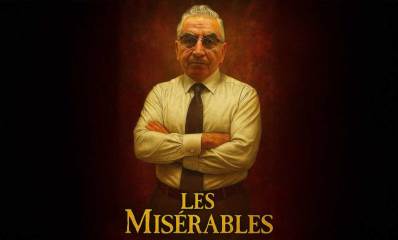 חיים ברוידא עומד בשילוב ידיים. מתחת לתמונתו הכיתוב בצרפתית: Les Miserables