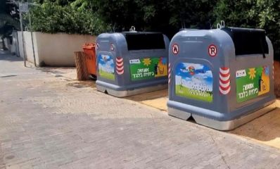 פחי אשפה אפורים. צילום: עיריית הרצליה