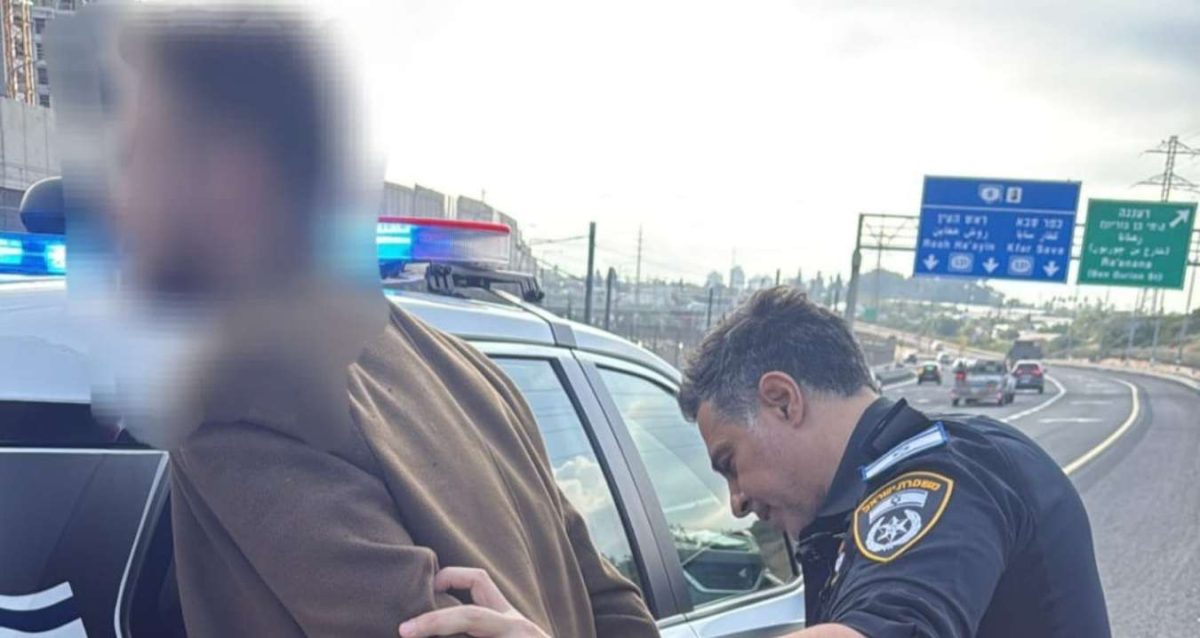 שוטר אוזק גבר שפניו מטושטשות שב"ח בכביש המהיר, צילום: משטרה